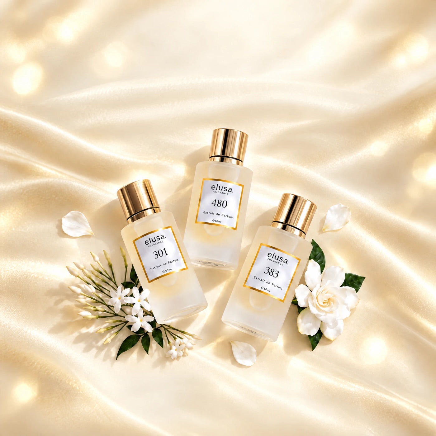 Elusa Extrait de Parfum 301, 480 und 383 auf Seide mit weißen Blüten